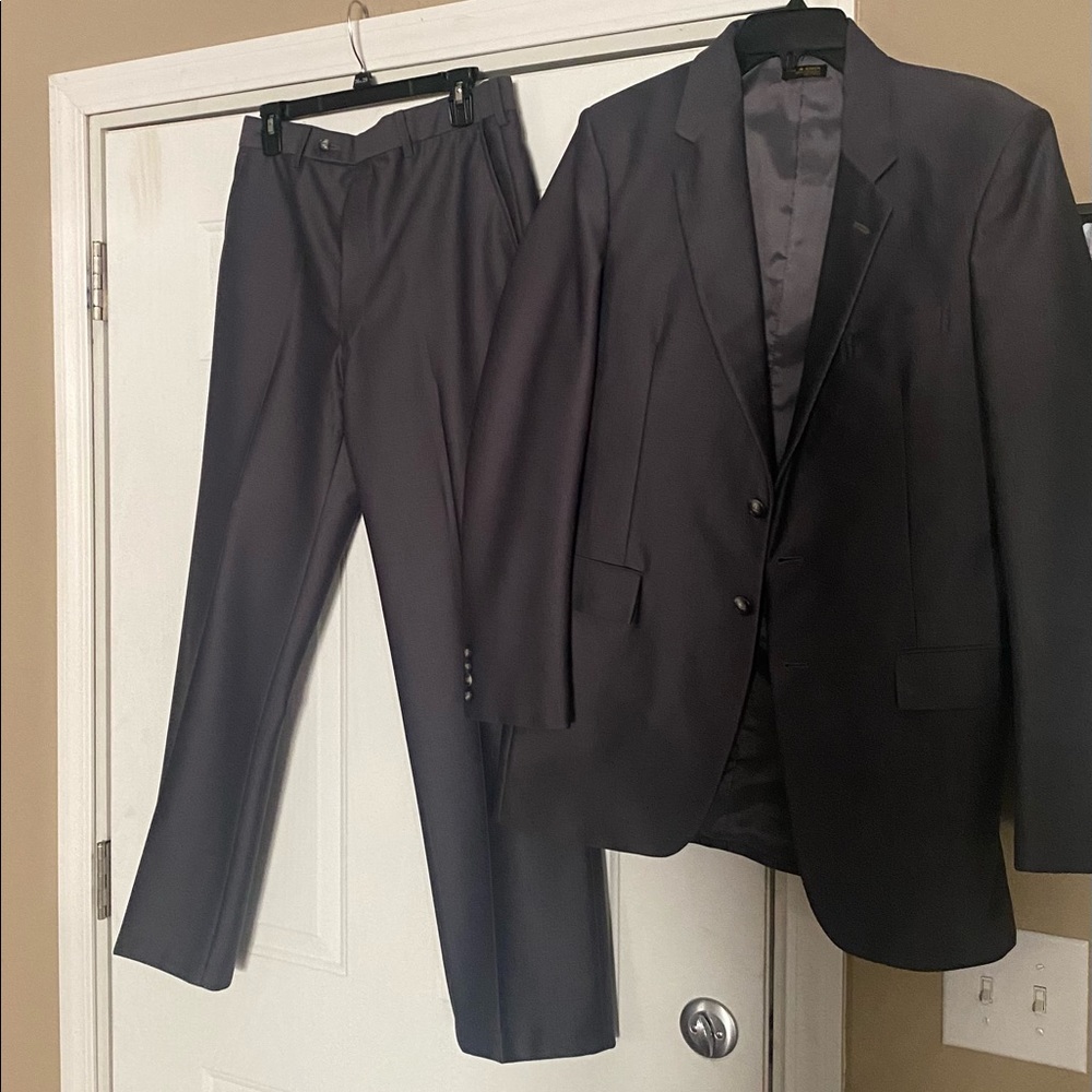 Gino capelli Mens suit coat 40L. Pants are Waist 34 40L.